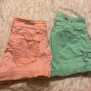 Two pairs of L.E.I high rise shorts.